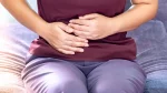 dr.consulta - mulher com as mãos na região da barriga com sintoma da doença inflamatória do colo do útero